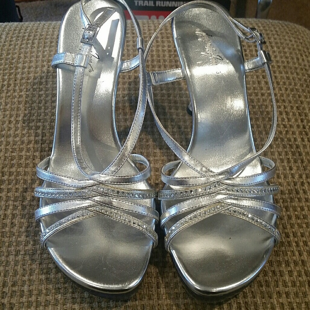 Silver open toed shoes